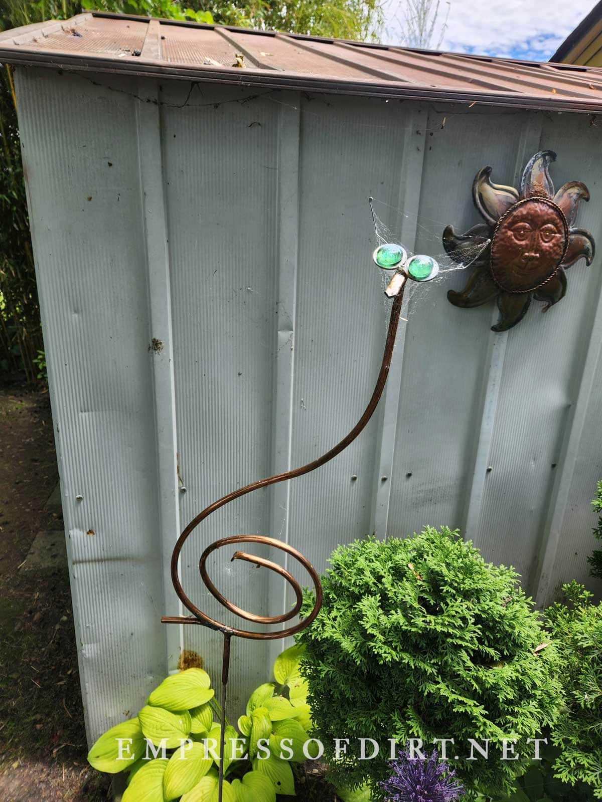 Funny copper garden art snake