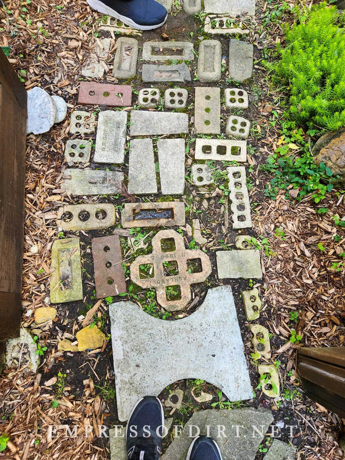 Charming garden path made from eclectic assortment of old bricks