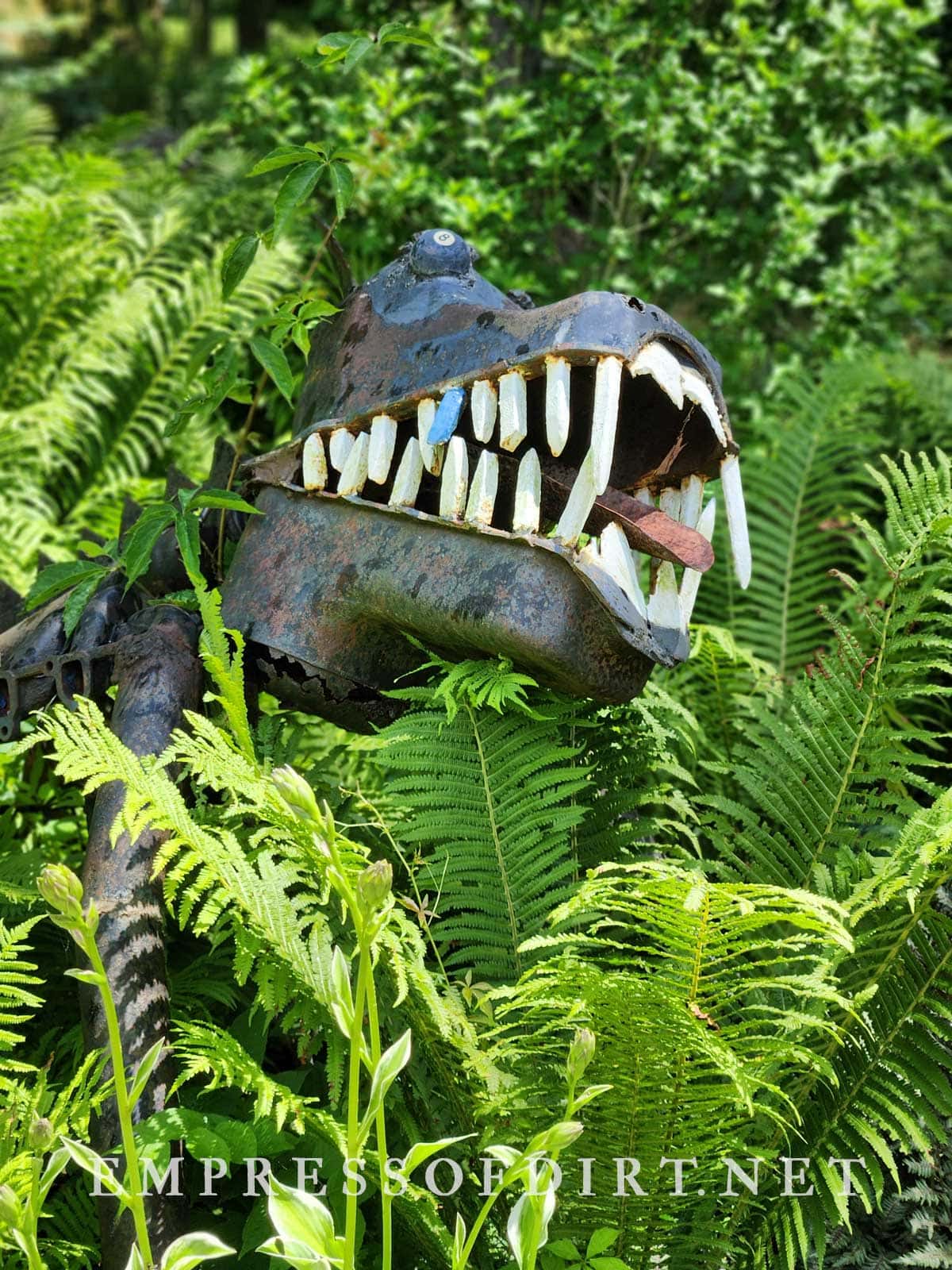 Dinosaur monster-like garden art