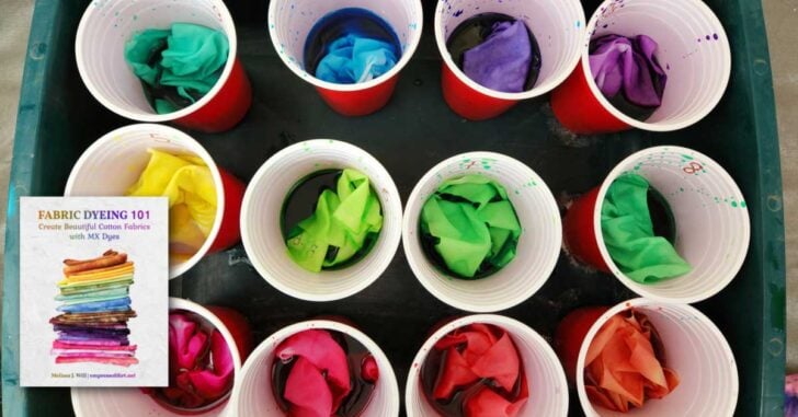 Rainbow colors in dye cups.