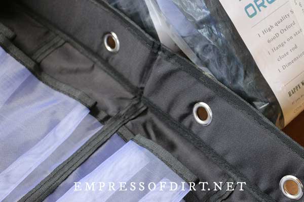 Shoe bag organizer with grommet holes.
