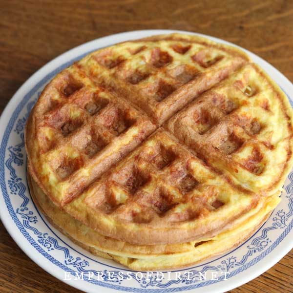 Freshly made chaffles (keto waffles) on plate.
