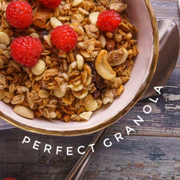 Granola in bowl with raspberries.
